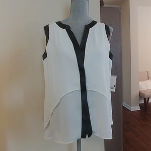 Blouse with faux leather trim
